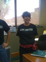 woman in live united shirt
