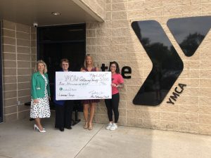 The local bank presenting a check to the YMCA in Ashland, MO | Community Bank