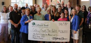 Check presentation photo for $186,000 for Five Area Non-Profits